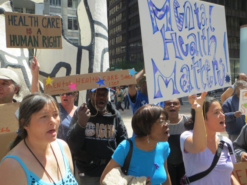 Health care providers and patients rally in support of mental health services
