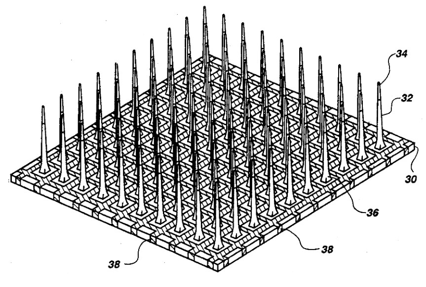 Microelectrode array. CC Image by Richard A Normann. Tbe actual size of this array is 4 x 4 mm 
